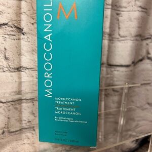Moroccanoil Treatment in Teal Packaging